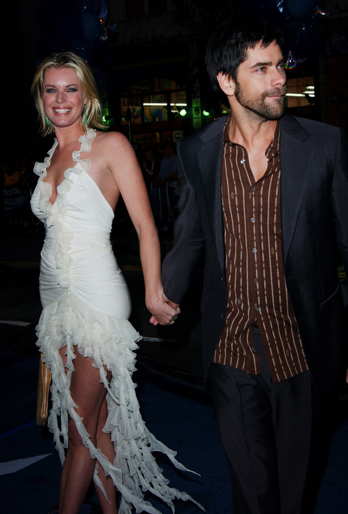 Rebecca Romijn a John Stamos
