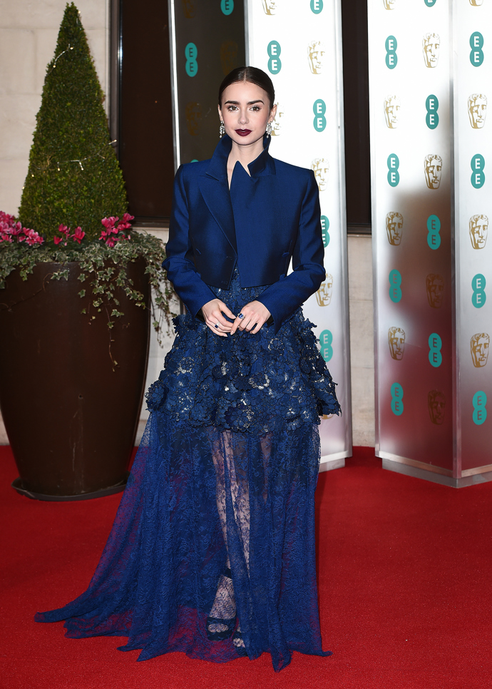Lily Collins

Na předávání cen BFA Awards v Londýně oblékla šaty Givenchy Haute Couture.
