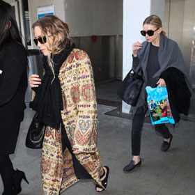 

Mary Kate Olsen a Ashley Olsen v roce 2014 
