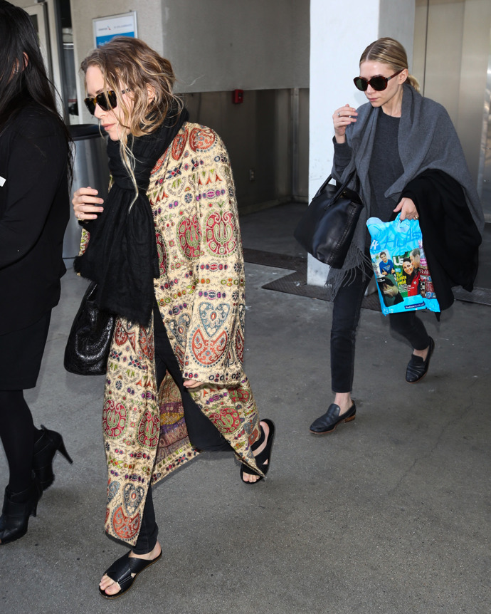  

Mary Kate Olsen a Ashley Olsen v roce 2014 
