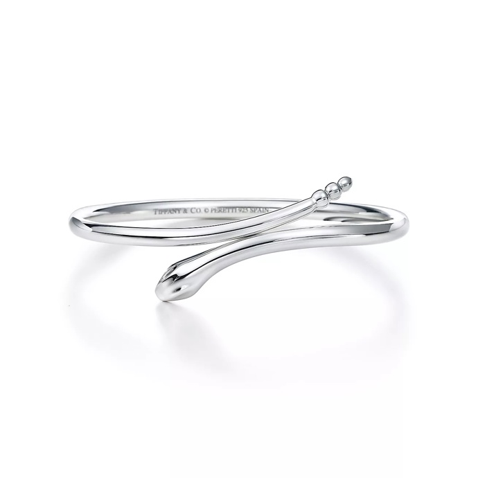  

Elsa Peretti Snake Bangle, Tiffany & Co., 1100 USD

