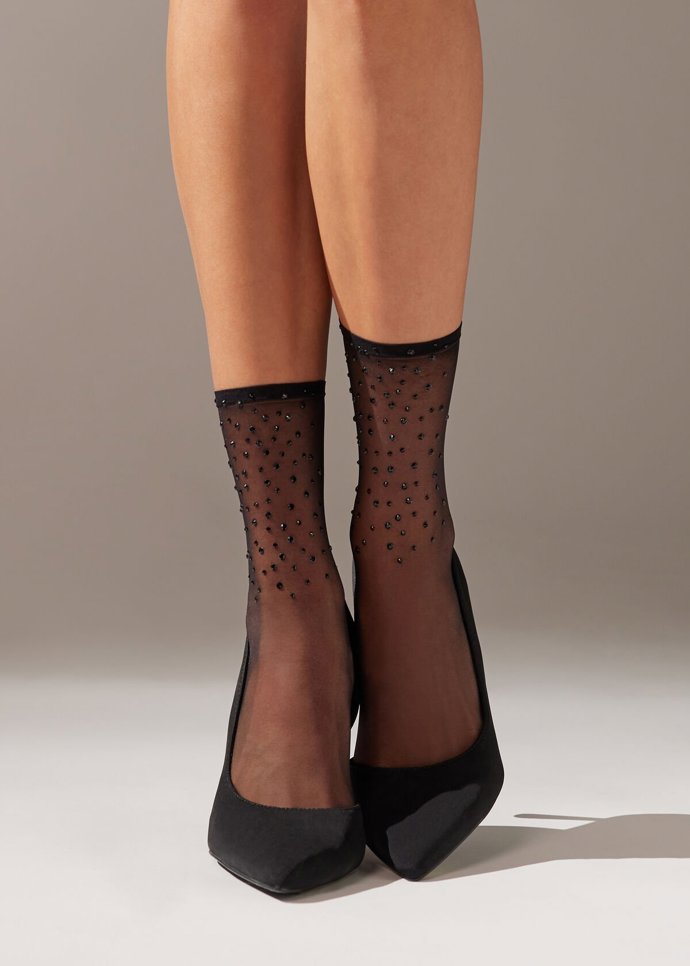  

Krátké průsvitné ponožky se štrasem, Calzedonia, 179 Kč 
