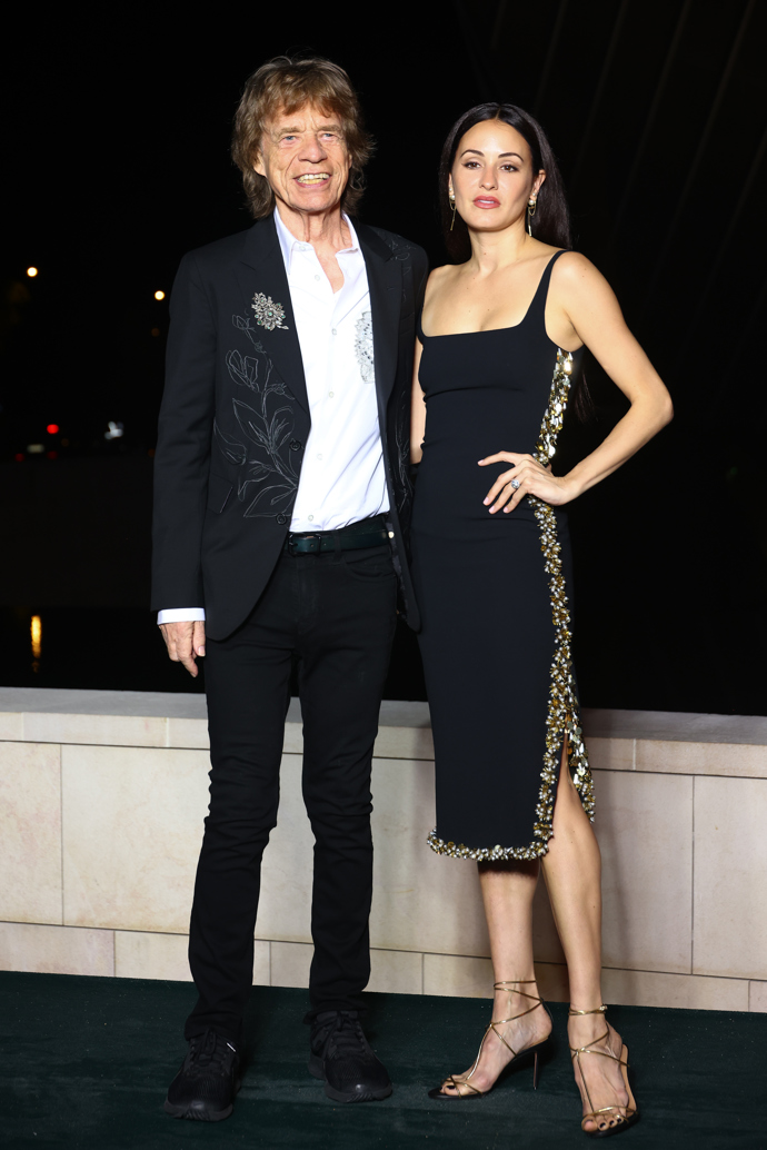  

Mick Jagger a Melanie Hamrick na pre-party s názvem The Prelude To The Olympics 
