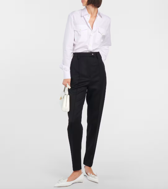  Kalhoty s vysokým pasem a zúženými nohavicemi, Prada, prodává MyTheresa, 32 824 Kč