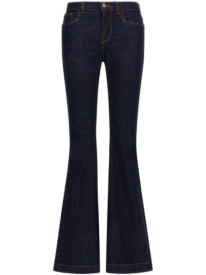  Denimové kalhoty Logo-patch flared jeans, Roberto Cavalli, 491 eur, prodává Farfetch
