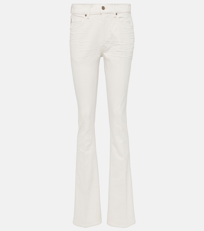  Denimové kalhoty High-rise flared jeans, Tom Ford, 690 eur, prodává Mytheresa
