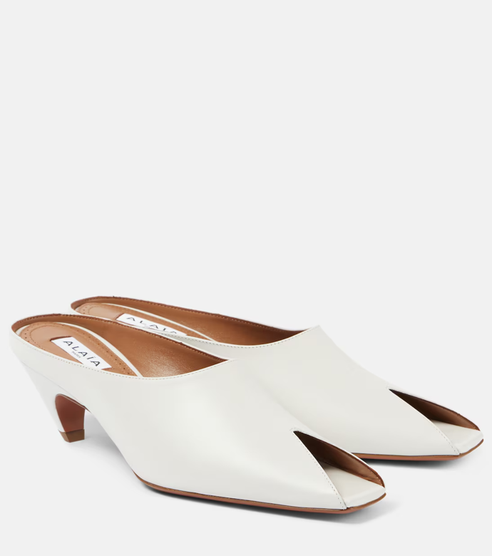 Kožené mules, Alaia, Mytheresa, 30 344 Kč