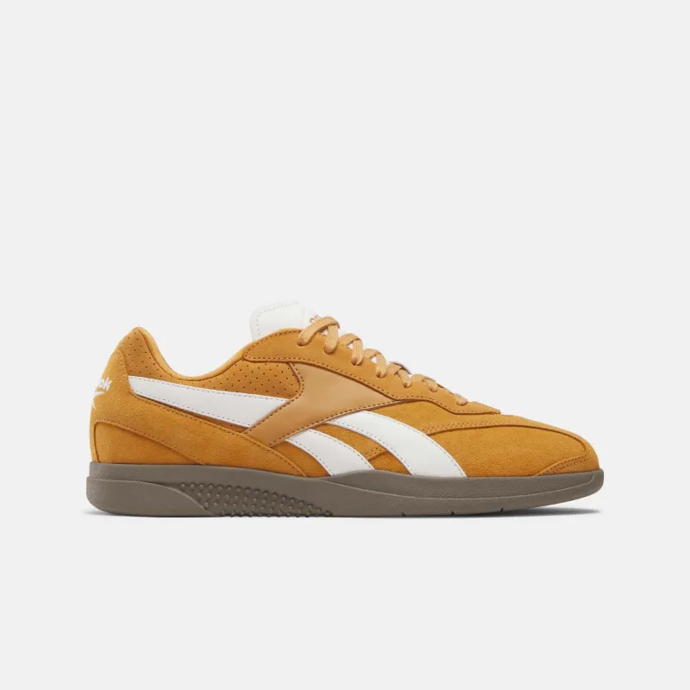 Hořčicově žluté retro tenisky, Reebok, 110 Eur   