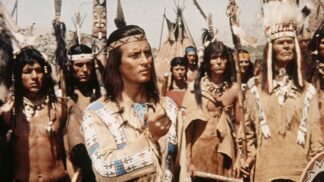 Spěchá na pomoc příteli, a telegrafuje guvernérovi, aby poslal armádu na pomoc Apačům, proti kterým se spojili bandité s Čivarily náčelníka Bílého buvola.