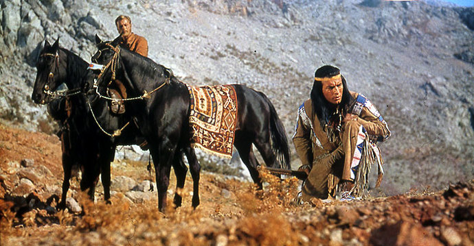 Složil ji Martin Bottcher, který komunikoval s producenty pouze po telefonu. První knihu o Vinnetouovi přečetl až v 78 letech.