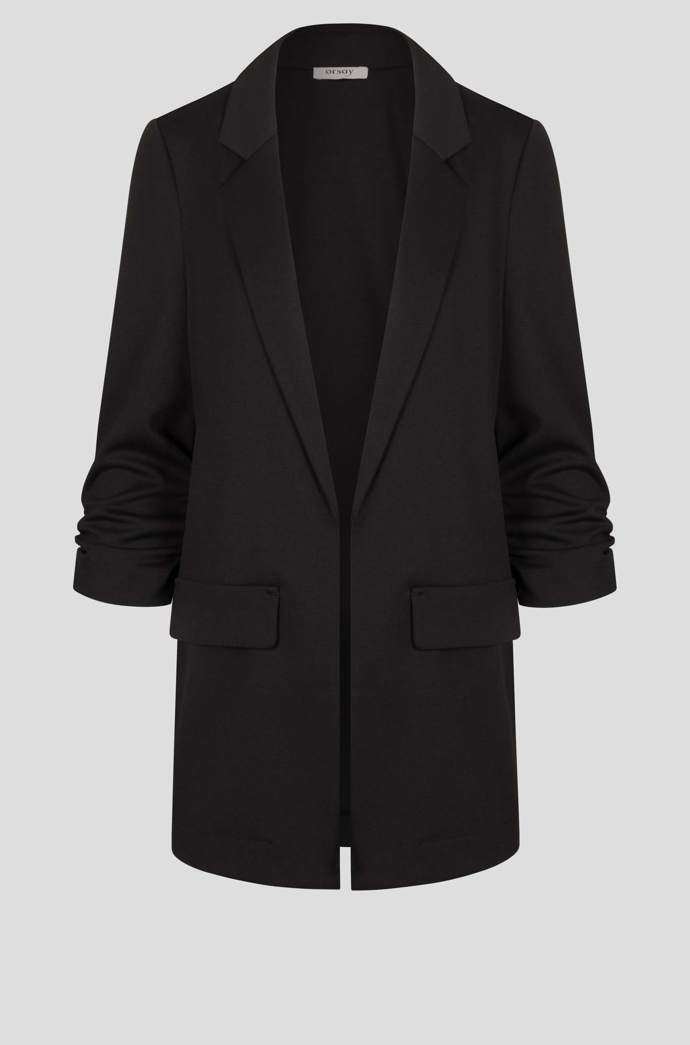 Trendy bude i klasické černé sako, které se dá kombinovat s čímkoli, například s cigaretovými nohavicemi.