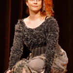 Vlasy Lucie Šoralové mají díky henně zrzavý nádech.