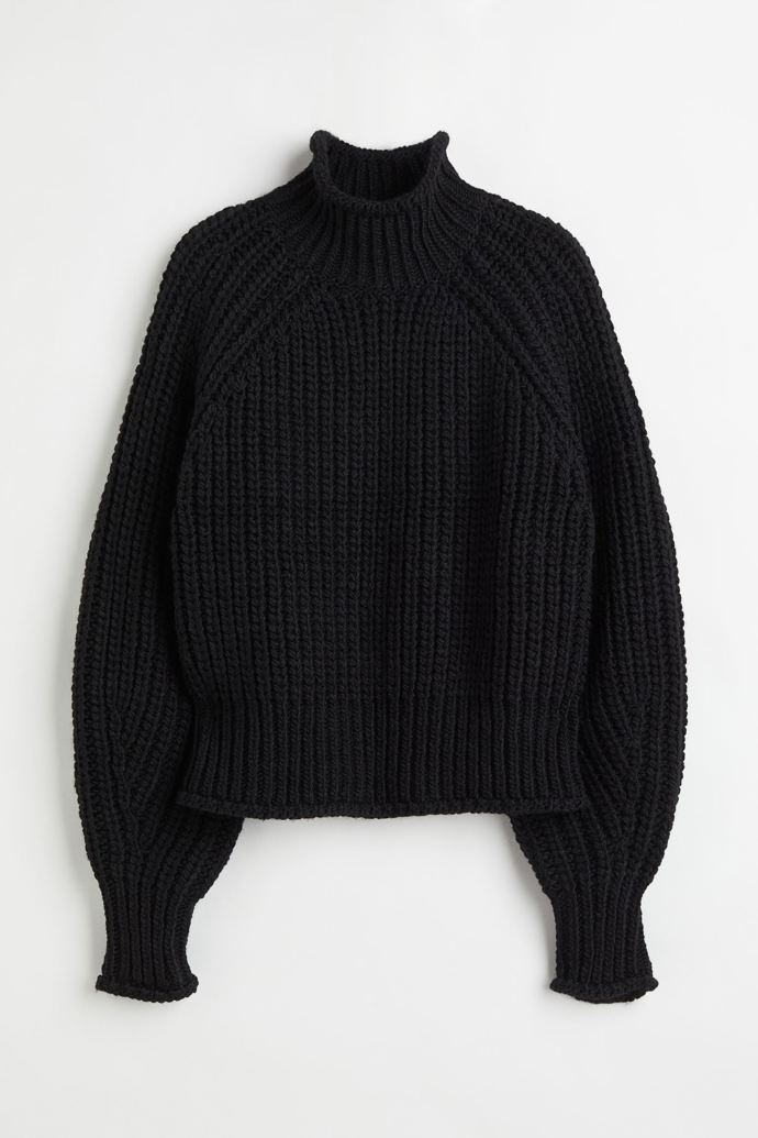 Černý pletený svetr. H&M, 749 Kč