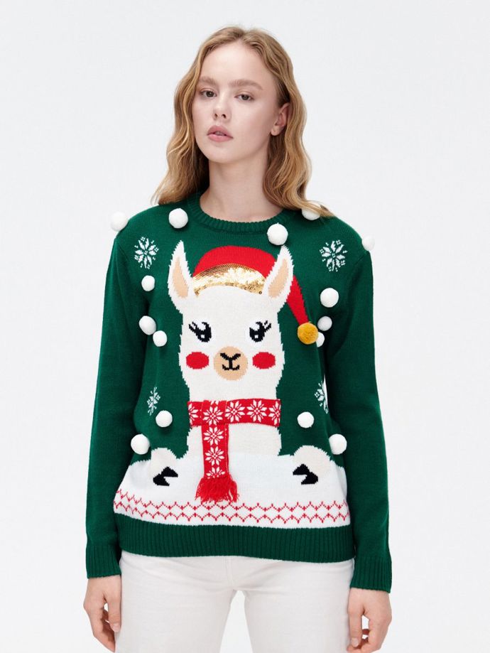 Zelený vánoční svetr. Značka Cropp, 599 Kč