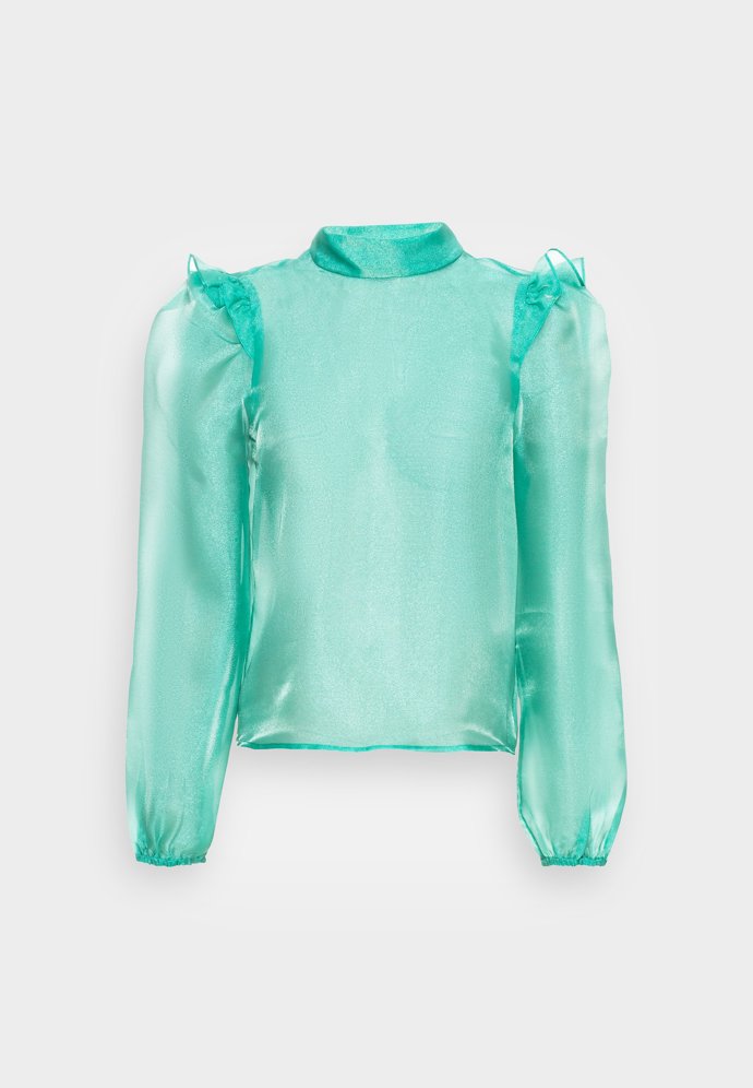 Pokud barvy, tak pořádně zářivé! Třeba tyrkysovou blůzku Monki (879 Kč), kterou navíc zdobí i zajímavá modelace širokých rukávů.