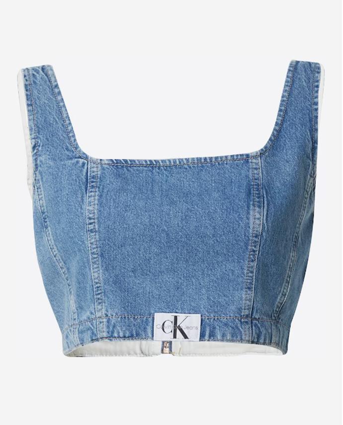 Korzetový živůtek nachází uplatnění v nejnovějších stylových kombinacích od základů postavených na džínovině. (Calvin Klein,1 999 Kč)