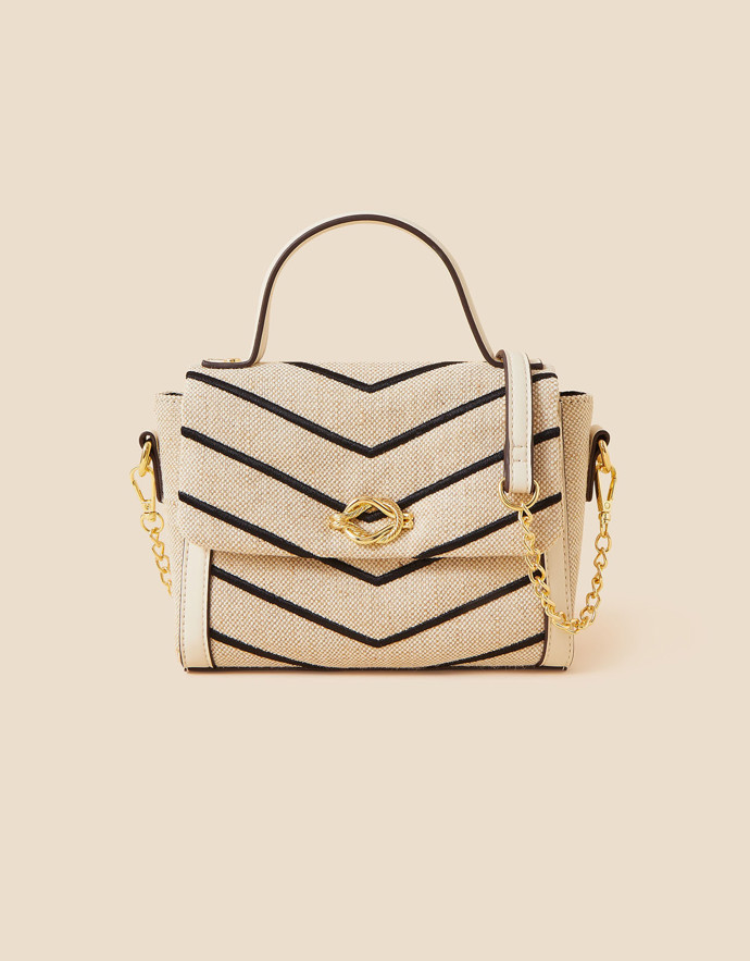 A nemůžeme opomenout ani doplňky. Kabelka, Accessorize, 1 299 Kč