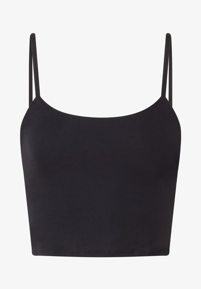Stejně tak vám v pouliční baletní výbavě nesmí chybět crop top s úzkými ramínky. Oysho, 599 Kč