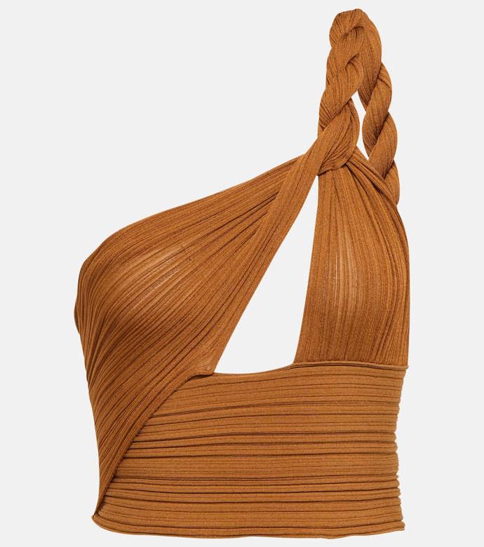 Unikátní zpracování důmyslně seskládaných otvorů představuje v kolekci pro aktuální období také značka Balmain.