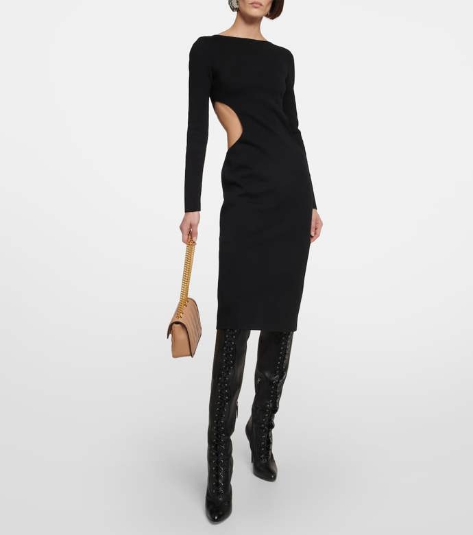 Gucci a jeho nezvykle strohý přístup k aktuálnímu hitu. Okrouhlé průstřihy v pase patří k nejvýraznějším střihovým úpravám sezony.