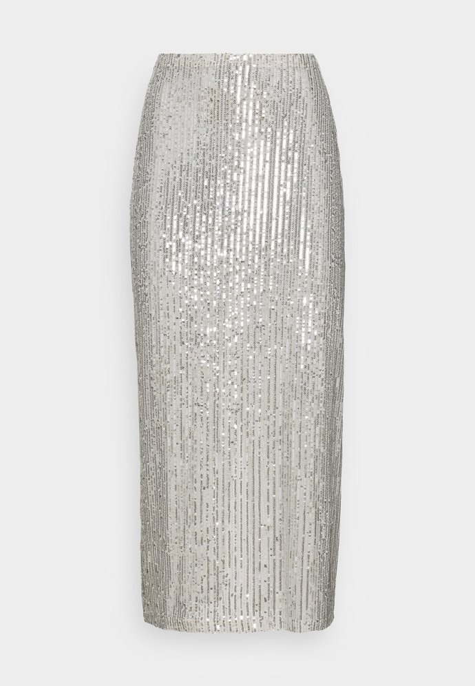 Sukně úzkého střihu sahající ke kotníkům potřebuje pohodlně vysoký rozparek. (NA-KD, 1 300 Kč)