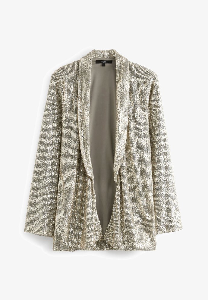 Večírkový mód. Ten ve vás vzápětí po oblečení zapne sako Next, 2 600 Kč.