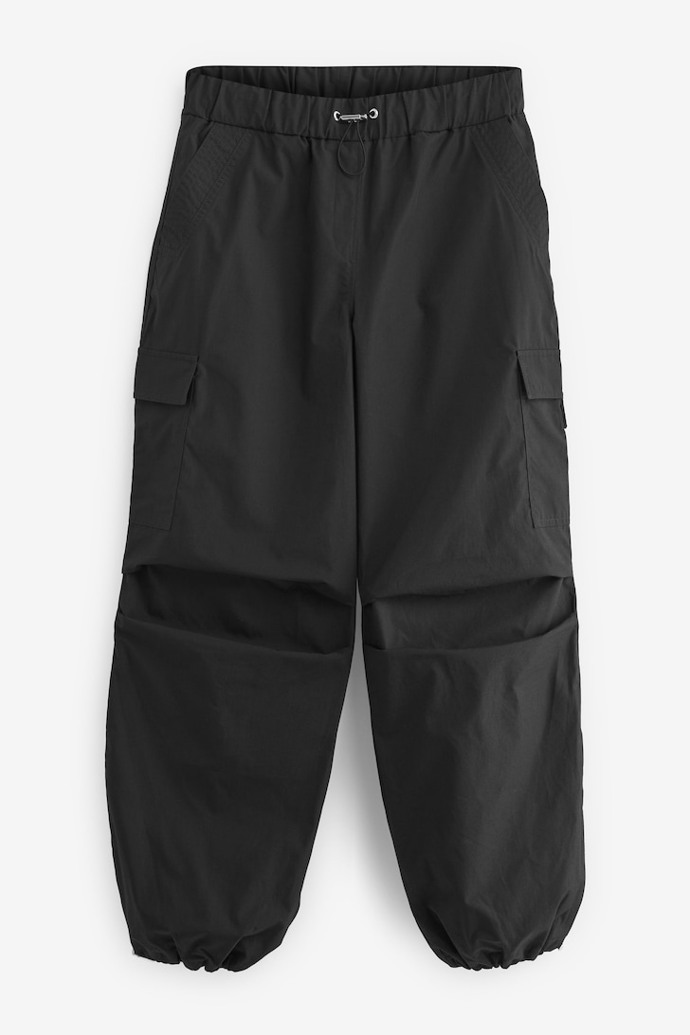 Šusťákové cargo kalhoty typu parachute, Next. (810 Kč)