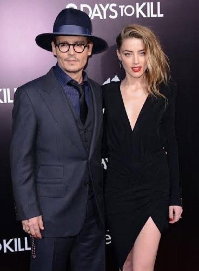 S bývalou manželkou Amber Heard.