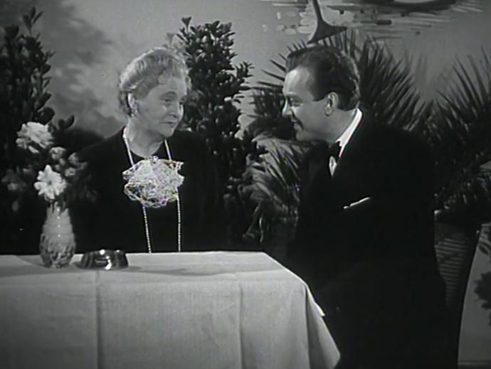 Ella Nollová a Karel Höger. Čtrnáctý u stolu (1943)