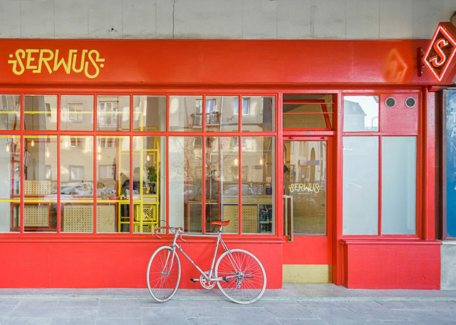 Zapiekanka-restaurant-in-Warsaw-with-painted-steel-frames-by-MFRMGR_dezeen_ss_18