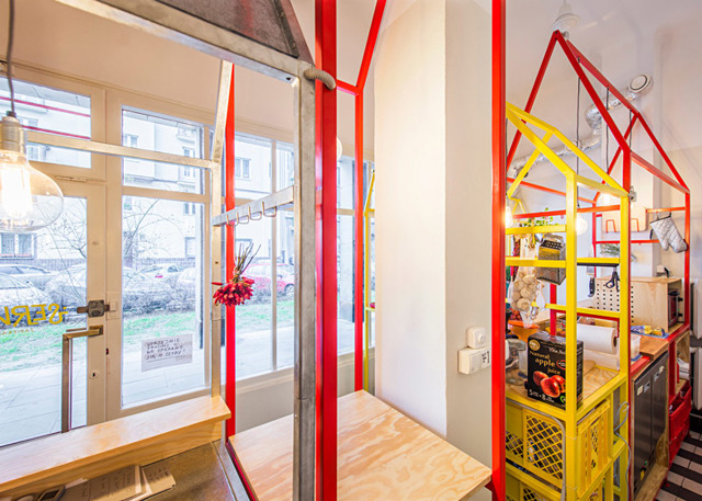 Zapiekanka-restaurant-in-Warsaw-with-painted-steel-frames-by-MFRMGR_dezeen_ss_20