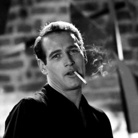 Herectví studoval na prestižní univerzitě Yale, pak hrál na Brodwayi a upozornil na sebe rolí boxera Rockyho Graziana, kterého měl hrát zesnulý James Dean. Zahrál si například po boku Elizabeth Taylor, ovšem jeho nejvýznamnějším parťákem byl Robert Redford, protože Butch Cassidy by bez Sundance Kida byl jako kavárna bez dortů. Za svůj život byl celkem devětkrát nominován na Oscara, sošku si nakonec odnesl za hlavní roli ve snímku Barva peněz. Byl také uznávaným režisérem, do svých filmů často obsazoval svoji druhou manželku a životní lásku Joann. Měl jednoho syna, který ovšem v roce 1978 zemřel na předávkování drogami. Paul Newman zemřel v roce 2008 ve věku osmdesáti tří let. 
Foto: aurorasginjoint.com