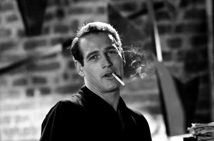 Herectví studoval na prestižní univerzitě Yale, pak hrál na Brodwayi a upozornil na sebe rolí boxera Rockyho Graziana, kterého měl hrát zesnulý James Dean. Zahrál si například po boku Elizabeth Taylor, ovšem jeho nejvýznamnějším parťákem byl Robert Redford, protože Butch Cassidy by bez Sundance Kida byl jako kavárna bez dortů. Za svůj život byl celkem devětkrát nominován na Oscara, sošku si nakonec odnesl za hlavní roli ve snímku Barva peněz. Byl také uznávaným režisérem, do svých filmů často obsazoval svoji druhou manželku a životní lásku Joann. Měl jednoho syna, který ovšem v roce 1978 zemřel na předávkování drogami. Paul Newman zemřel v roce 2008 ve věku osmdesáti tří let. 
Foto: aurorasginjoint.com