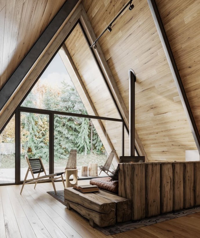 O tom, že architekti a designéři vzali opět na milost klasické áčkové stavby, jsme už psali. Pojďte se s námi podívat, jak dokonalý může mít moderní lesní chatka interiér.
