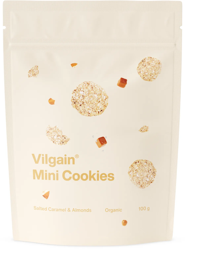 Vilgain Mini Cookies BIO ⁠–⁠ 100 g ⁠–⁠ ovesné sušenky plné oříšků a čokolády bez lepku. Jsou bohaté na nenasycené mastné kyseliny, které prokazatelně snižují hladinu cholesterolu v krvi a působí pozitivně na zdraví srdce a cév. Cena: 69 Kč / 100 g. 
