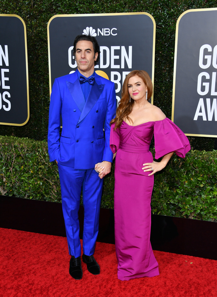 Také ho pořád vidíte jako Borata v titěrných tangách? 191 cm měřící komik a herec Sasha Baron Cohen je o 31 cm vyšší, než jeho paní, australská herečka a spisovatelka Isla Fisher. 
