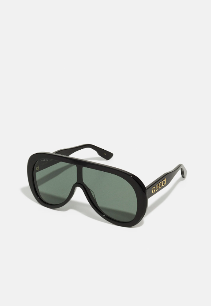 Luxusní acetátové pilotky, sluneční brýle, značka Gucci, přibližná cena 13 480 Kč. 
