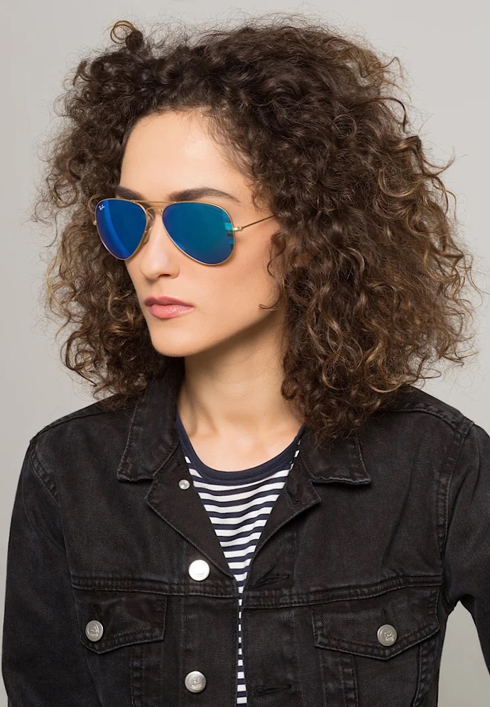Sluneční brýle: Ray Ban, 3 490 Kč
