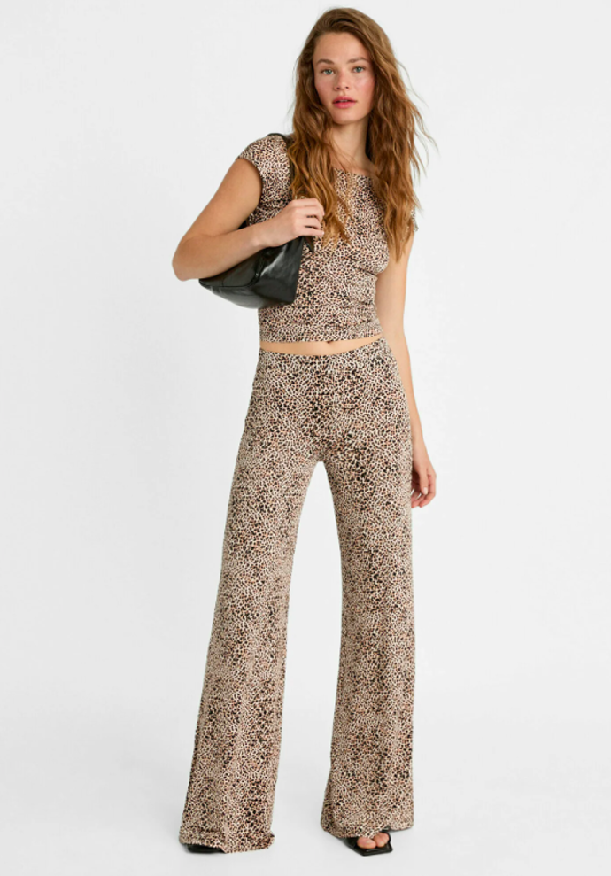 LEOPARD PRINT FLARED - Kalhoty, značka Stradivarius, přibližná cena 549 Kč. 
