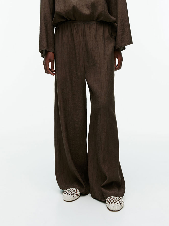 Volné kalhoty, Arket, 69 eur
