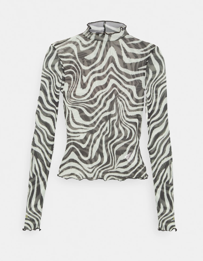 Top s dlouhým rukávem, Gina Tricot, 570 Kč.
Top s dlouhým rukávem, Gina Tricot, 570 Kč.