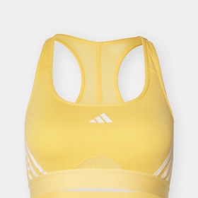 Žlutá sportovní podprsenka, adidas Performance, 1000 Kč.
