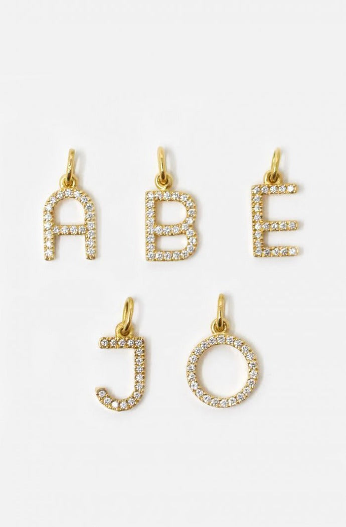 Přívěsek na řetízek Small Diamond Letter Charm, Sophie Keegan, 1500 gbp
