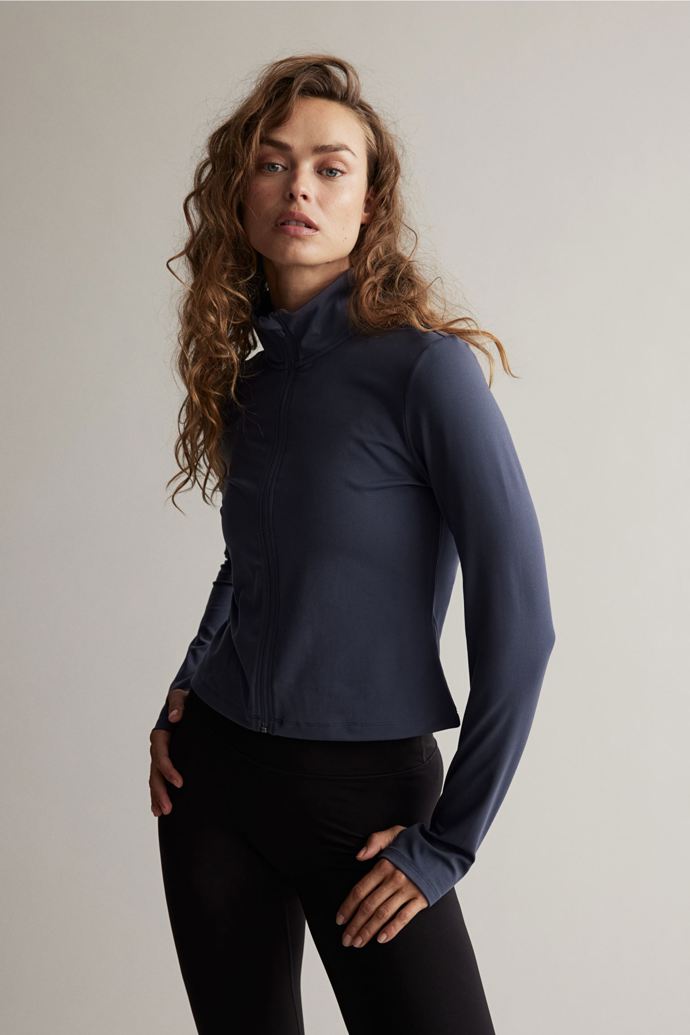 Sportovní bunda na zip z materiálu SoftMove™, H&M, 719 Kč

