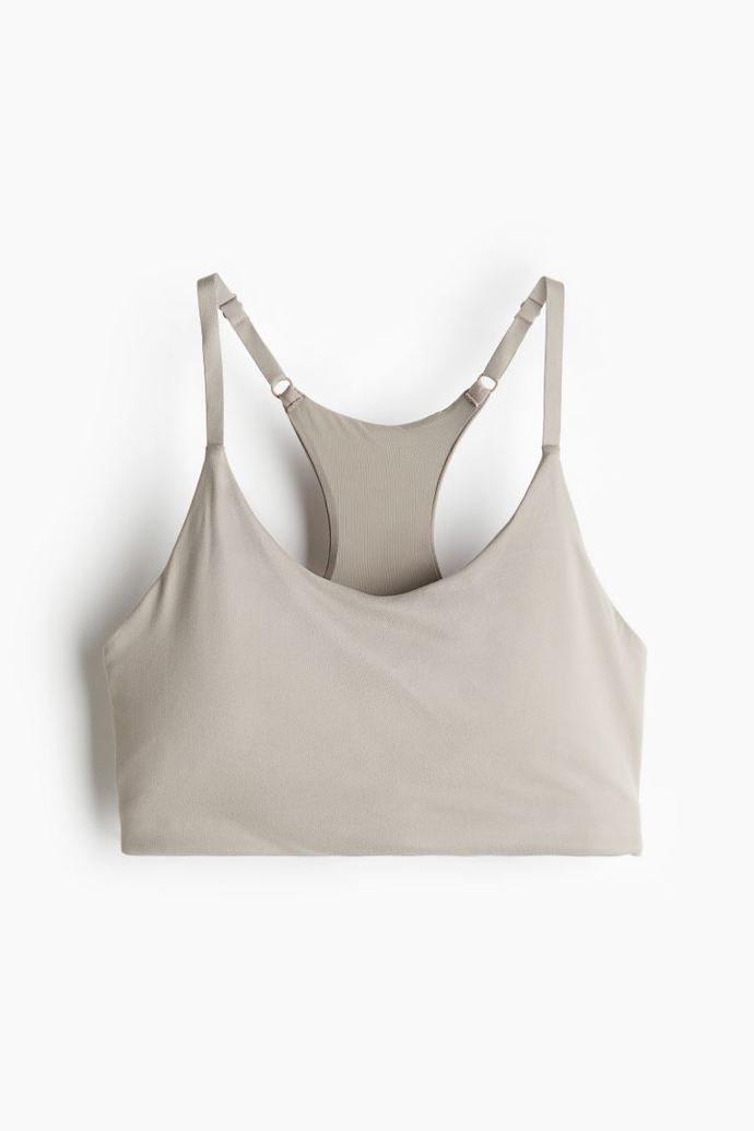 Sportovní podprsenka Light Support ze SoftMove™, H&M, 479 Kč
Sportovní podprsenka Light Support ze SoftMove™, H&M, 479 Kč