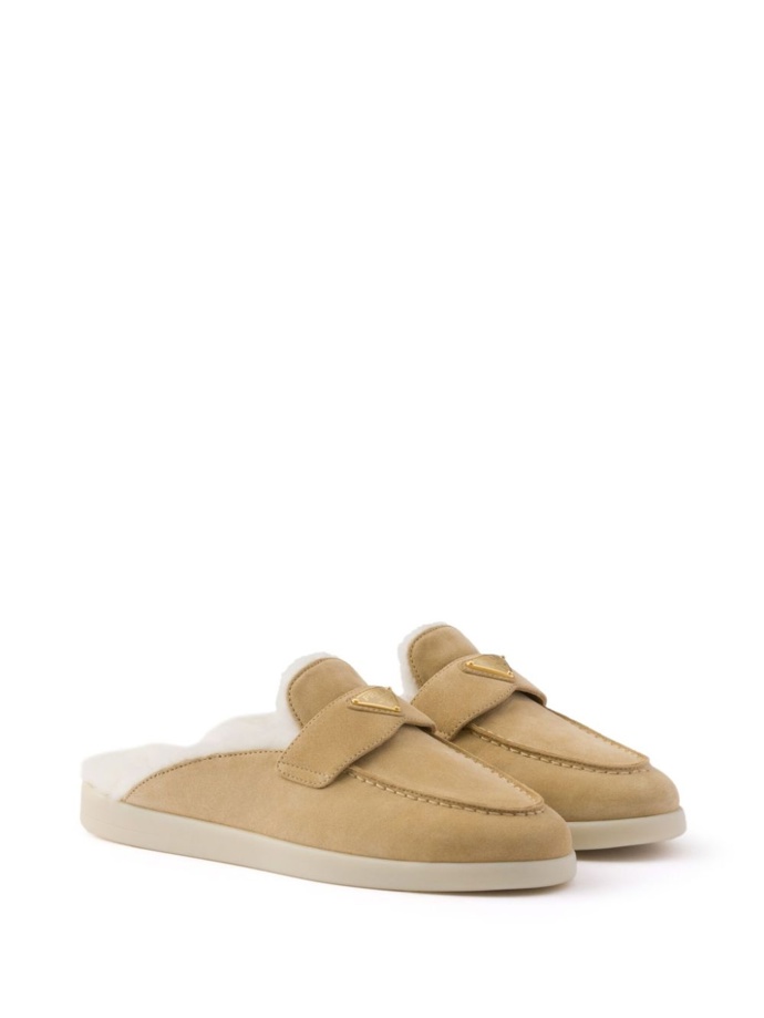 Papuče s beránkem Shearling mules, Prada, 1120 eur
