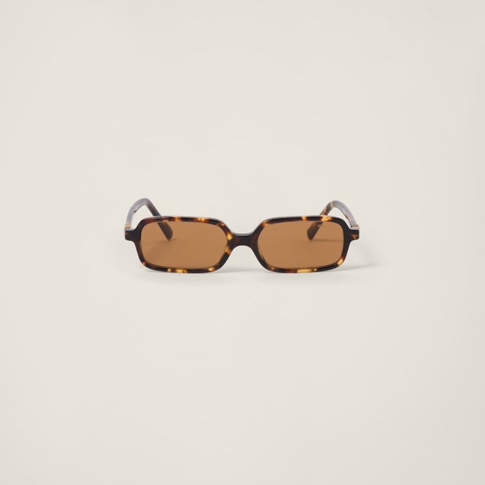 Sluneční brýle Miu Regard sunglasses, Miu Miu, 370 eur
