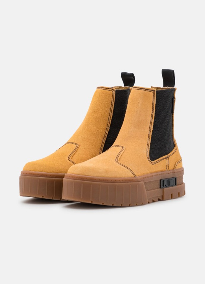 Žluté kotníkové boty na platformě, Puma, 2 400 Kč

