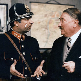 Kdo si skvěle zahrál komisaře Zdychynce v parádní Partii krásného dragouna?
