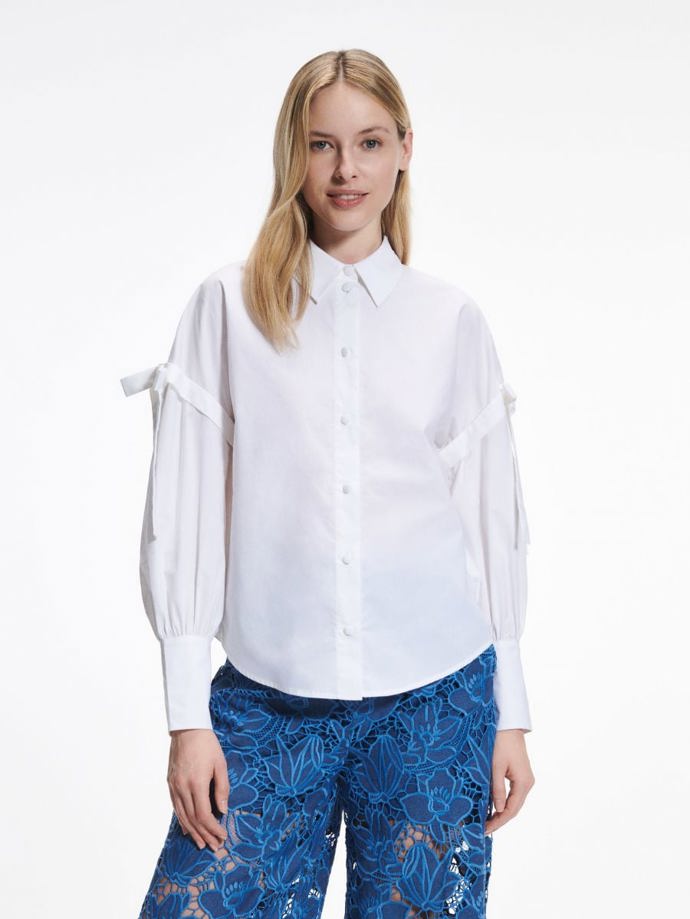 Nebraňte se extravagantním prvkům. Reserved, 999 Kč